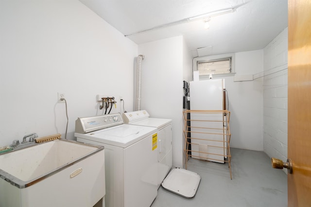 166 W 37th St, Bayonne, NJ 07086 - laundry room with washer and clothes dryer and a sink