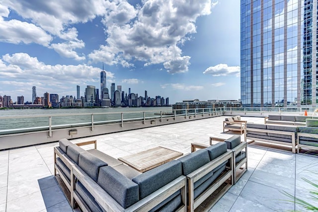 2 2nd St Unit 3805-1, Jersey City, NJ 07302 - view of patio featuring a skyline view, an outdoor hangout area, and a water view