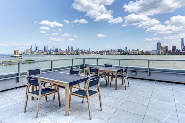 2 2nd St Unit 3805-1, Jersey City, NJ 07302 - view of patio with a skyline view, outdoor dining space, and a water view
