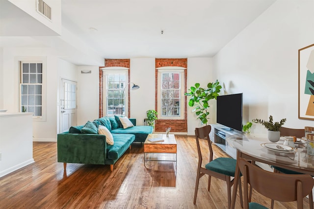 347 Varick St Unit 114A, Jersey City, NJ 07302 - living room with wood finished floors and baseboards