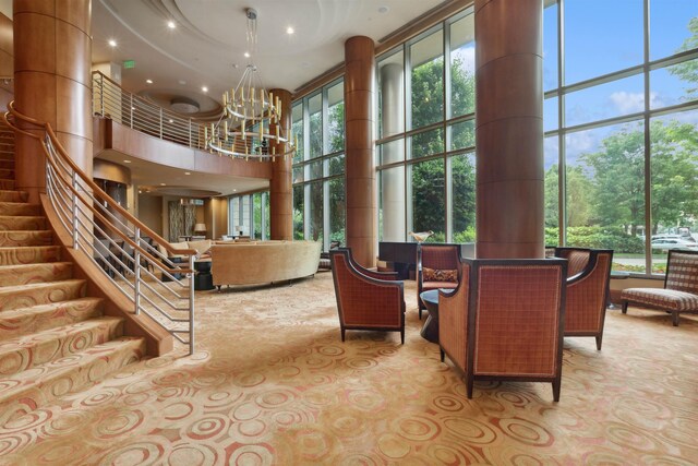 8100 River Rd Unit 0107, North Bergen, NJ 07047 - common area featuring a high ceiling and stairs