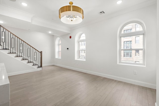 133 Clifton Pl Unit 2, Jersey City, NJ 07304 - entrance foyer featuring light wood-type flooring, plenty of natural light, ornamental molding, stairs, and recessed lighting
