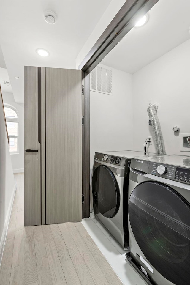 133 Clifton Pl Unit 2, Jersey City, NJ 07304 - washroom featuring separate washer and dryer