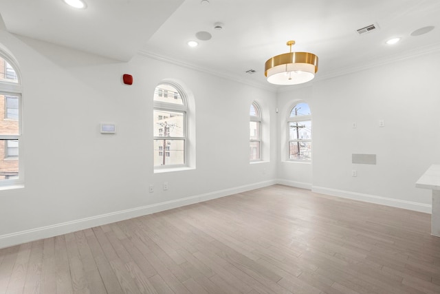 133 Clifton Pl Unit 2, Jersey City, NJ 07304 - unfurnished room featuring ornamental molding, healthy amount of natural light, light wood finished floors, and recessed lighting