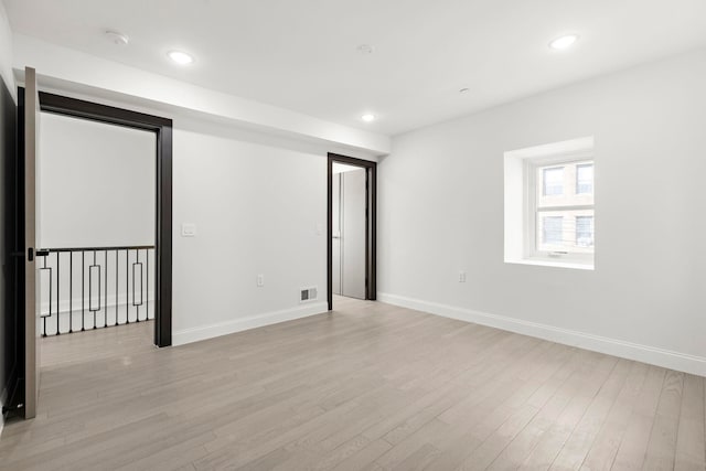 133 Clifton Pl Unit 2, Jersey City, NJ 07304 - unfurnished room featuring light wood-style flooring, recessed lighting, and a smoke detector
