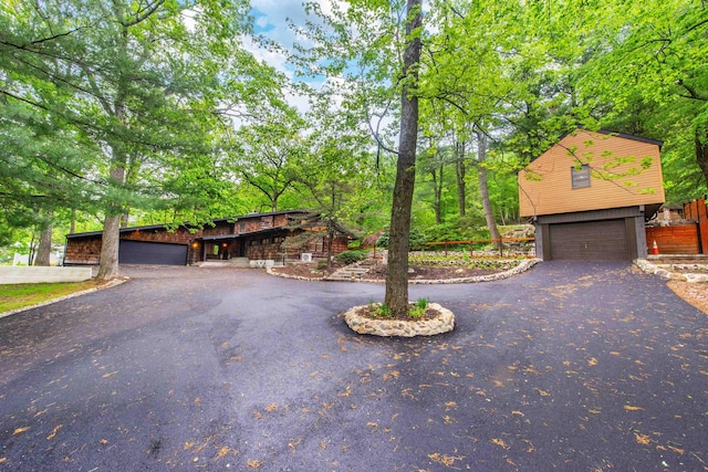203 Stanhope Rd, Sparta, NJ 07871 - view of front facade with asphalt driveway and an attached garage