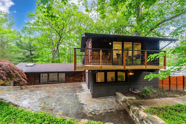 203 Stanhope Rd, Sparta, NJ 07871 - view of front of house featuring a balcony and a patio area