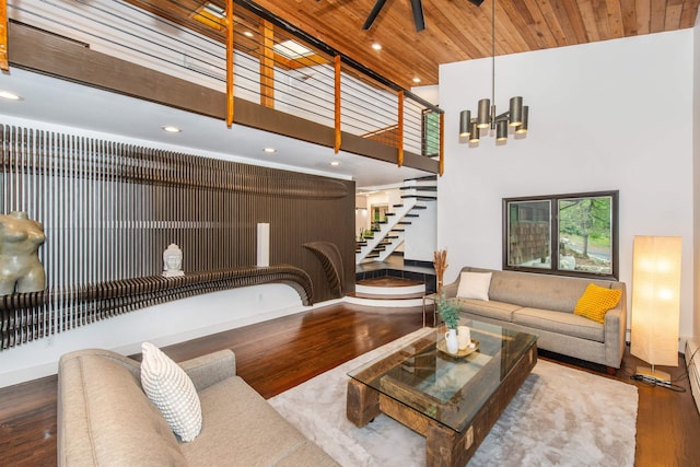 203 Stanhope Rd, Sparta, NJ 07871 - living room with a towering ceiling, wood finished floors, stairway, a chandelier, and recessed lighting