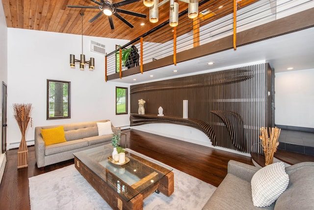 203 Stanhope Rd, Sparta, NJ 07871 - living room featuring wood finished floors, a baseboard radiator, ceiling fan, a towering ceiling, and recessed lighting
