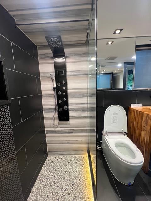 203 Stanhope Rd, Sparta, NJ 07871 - full bathroom with tiled shower, tile walls, and tile patterned flooring
