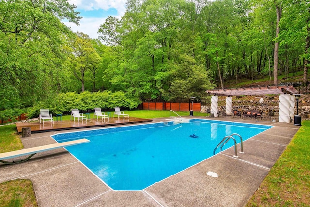203 Stanhope Rd, Sparta, NJ 07871 - outdoor pool with a diving board, a patio, and a forest view