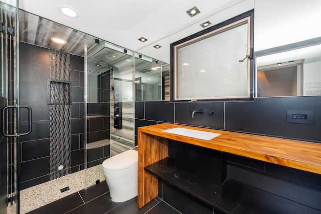 203 Stanhope Rd, Sparta, NJ 07871 - bathroom featuring tile patterned floors, a shower stall, vanity, tile walls, and recessed lighting