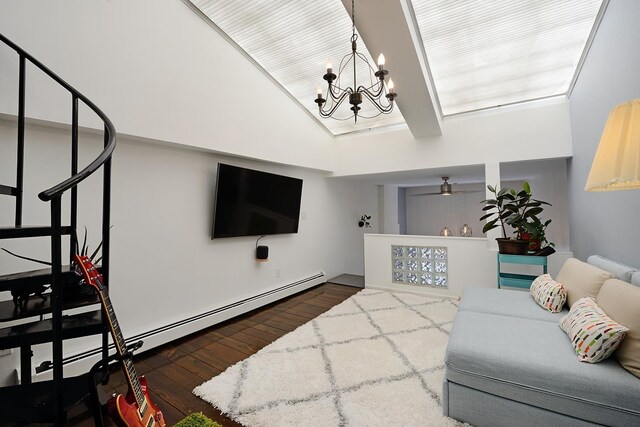 212 9th St Unit 4B, Jersey City, NJ 07302 - living area featuring a chandelier, wood-type flooring, baseboard heating, and high vaulted ceiling