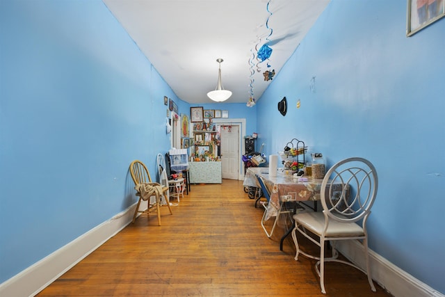 dining area featuring hardwood / wood-style floors