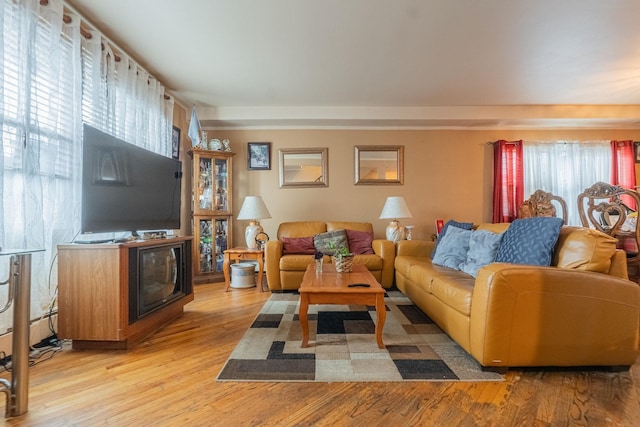 509 81st St, North Bergen, NJ 07047 - living room featuring plenty of natural light and light wood-style floors