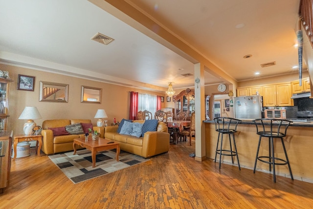 509 81st St, North Bergen, NJ 07047 - living room featuring wood finished floors and ornamental molding