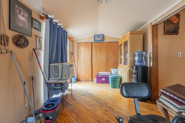 509 81st St, North Bergen, NJ 07047 - miscellaneous room featuring light wood-type flooring, lofted ceiling, and cooling unit
