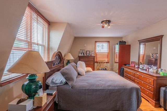 509 81st St, North Bergen, NJ 07047 - bedroom with multiple windows and wood finished floors