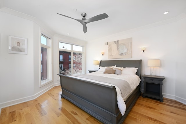 bedroom with baseboards, light wood-type flooring, ornamental molding, recessed lighting, and a ceiling fan