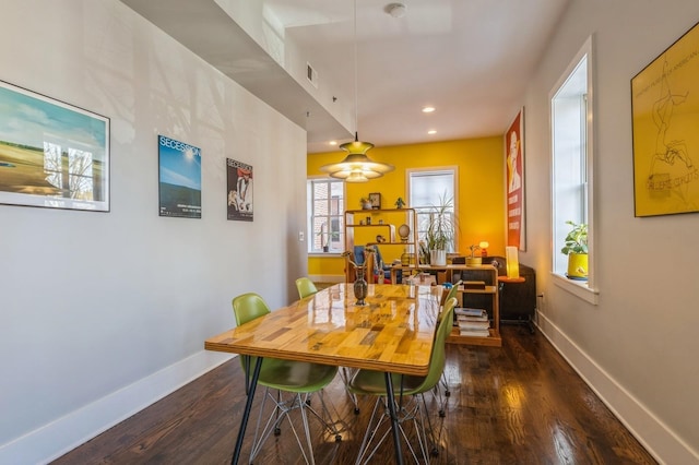 dining area featuring dark wood-style flooring, recessed lighting, and baseboards