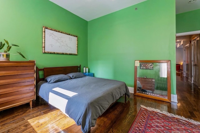 bedroom featuring wood finished floors