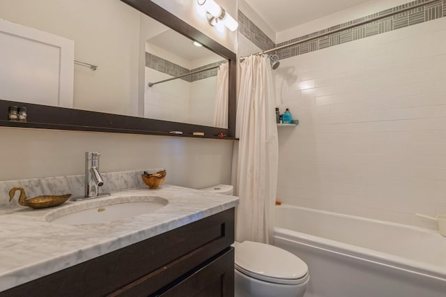 bathroom featuring toilet, shower / bath combination with curtain, and vanity