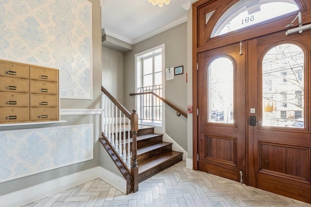 entrance foyer featuring stairs, wallpapered walls, baseboards, and crown molding