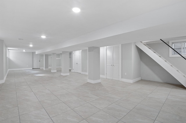 95 Claremont Ave, Jersey City, NJ 07304 - finished basement with recessed lighting, light tile patterned flooring, and stairs
