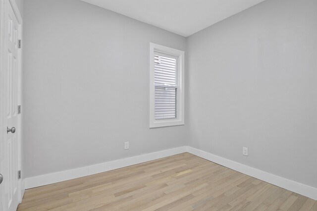 95 Claremont Ave, Jersey City, NJ 07304 - spare room featuring baseboards and light wood finished floors