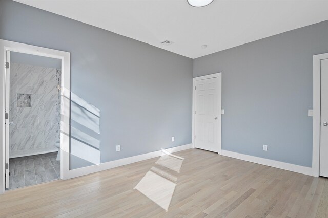 95 Claremont Ave, Jersey City, NJ 07304 - spare room featuring light wood-type flooring and baseboards