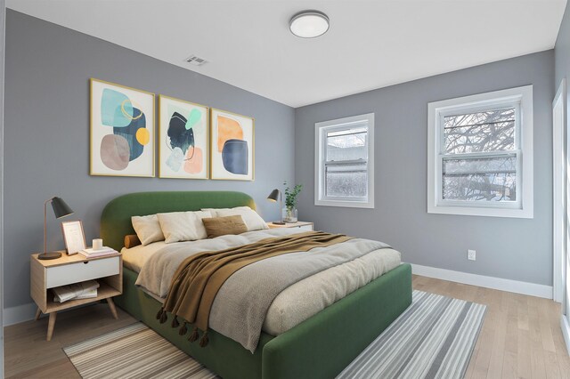 95 Claremont Ave, Jersey City, NJ 07304 - bedroom with light wood finished floors and baseboards