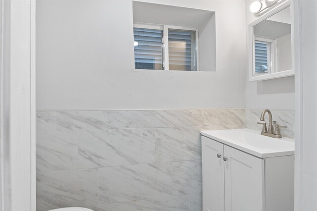 95 Claremont Ave, Jersey City, NJ 07304 - half bath featuring vanity and tile walls