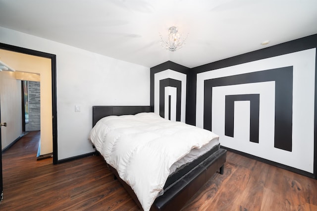 bedroom featuring dark wood-type flooring