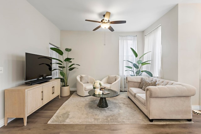 263 10th St Unit 2D, Jersey City, NJ 07302 - living room featuring ceiling fan, wood finished floors, and baseboards