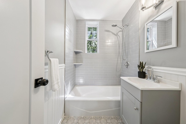 340 Fairmount Ave Apt 209, Jersey City, NJ 07306 - bathroom featuring vanity, bathtub / shower combination, and wainscoting