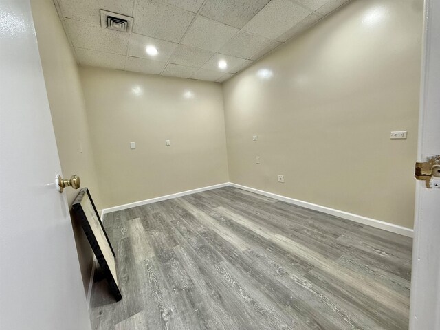 201 Livingston Ave, New Brunswick, NJ 08901 - empty room with a drop ceiling, wood finished floors, baseboards, and recessed lighting