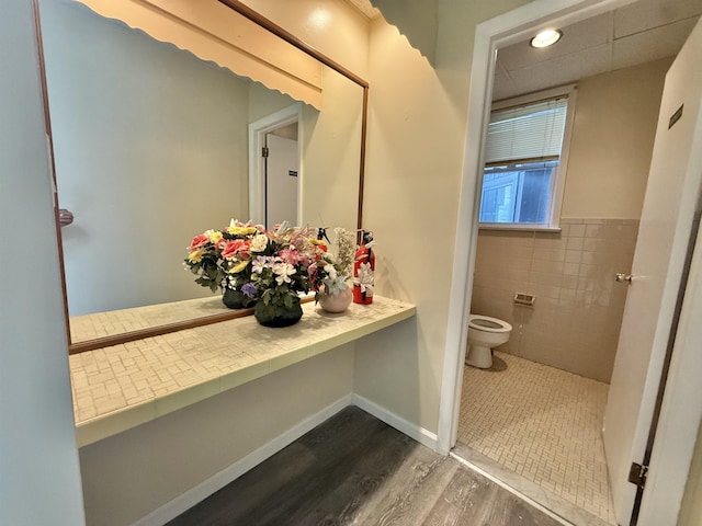 201 Livingston Ave, New Brunswick, NJ 08901 - bathroom with wood finished floors, toilet, and baseboards