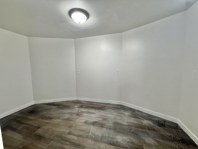 201 Livingston Ave, New Brunswick, NJ 08901 - empty room with baseboards and dark wood-type flooring