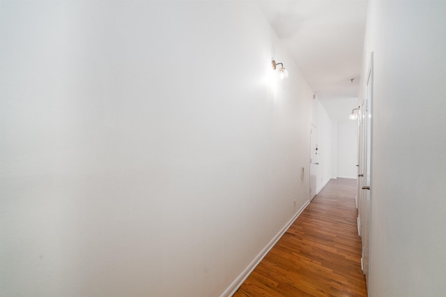 hallway featuring hardwood / wood-style floors