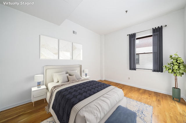 bedroom featuring hardwood / wood-style floors