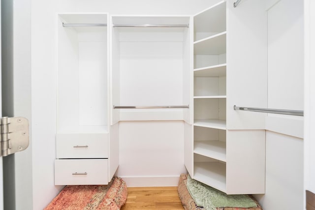 384 7th St Unit 5, Jersey City, NJ 07302 - walk in closet featuring wood finished floors