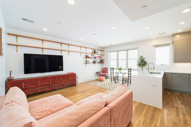 384 7th St Unit 5, Jersey City, NJ 07302 - living room with light wood-style floors and recessed lighting