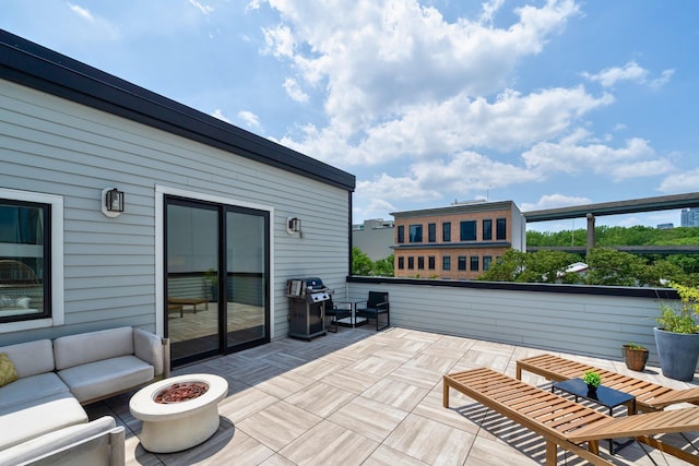 384 7th St Unit 5, Jersey City, NJ 07302 - view of patio featuring grilling area and an outdoor fire pit