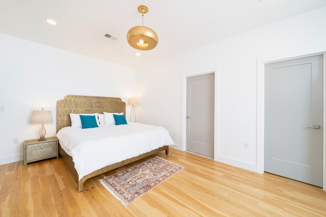 384 7th St Unit 5, Jersey City, NJ 07302 - bedroom with light wood-style floors and recessed lighting
