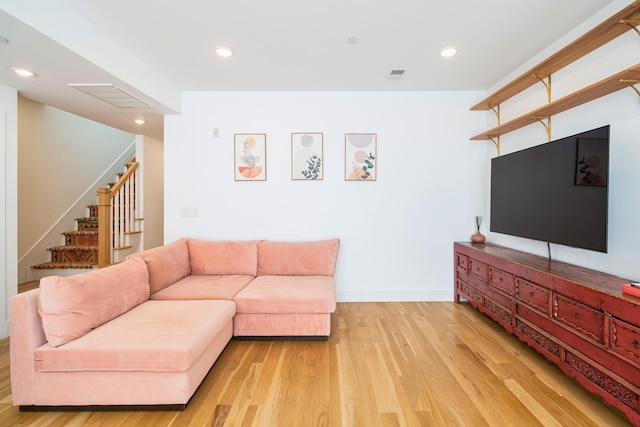 384 7th St Unit 5, Jersey City, NJ 07302 - living room with light wood-type flooring, stairs, and recessed lighting