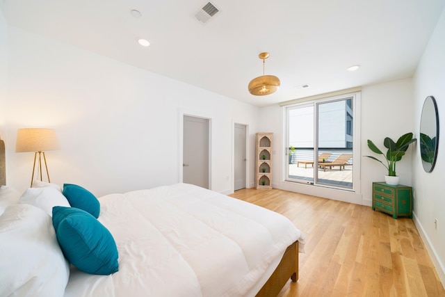 384 7th St Unit 5, Jersey City, NJ 07302 - bedroom featuring light wood finished floors, recessed lighting, and access to outside