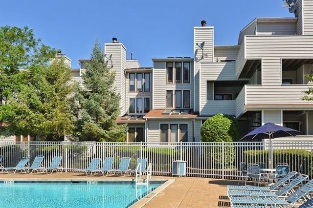 750 Mainsail Ln, Secaucus, NJ 07094 - community pool featuring fence and cooling unit