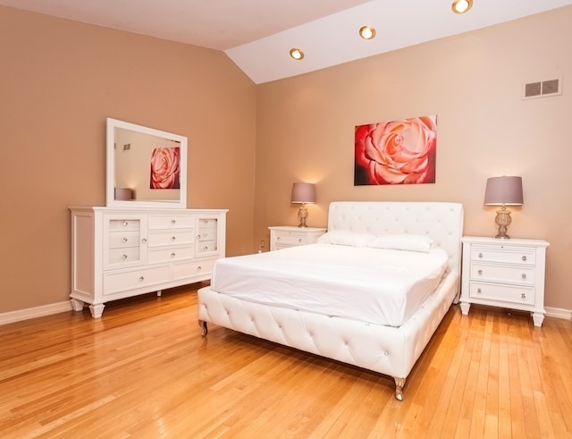 750 Mainsail Ln, Secaucus, NJ 07094 - bedroom featuring recessed lighting, vaulted ceiling, visible vents, light wood-type flooring, and baseboards