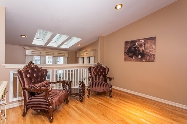 750 Mainsail Ln, Secaucus, NJ 07094 - living area featuring baseboards, wood finished floors, lofted ceiling with skylight, and recessed lighting