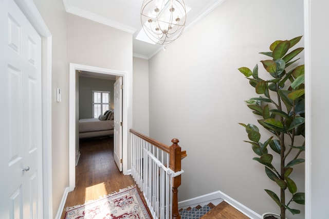 78 Madison St Unit 2, Hoboken, NJ 07030 - hall featuring an upstairs landing, ornamental molding, a chandelier, and wood finished floors